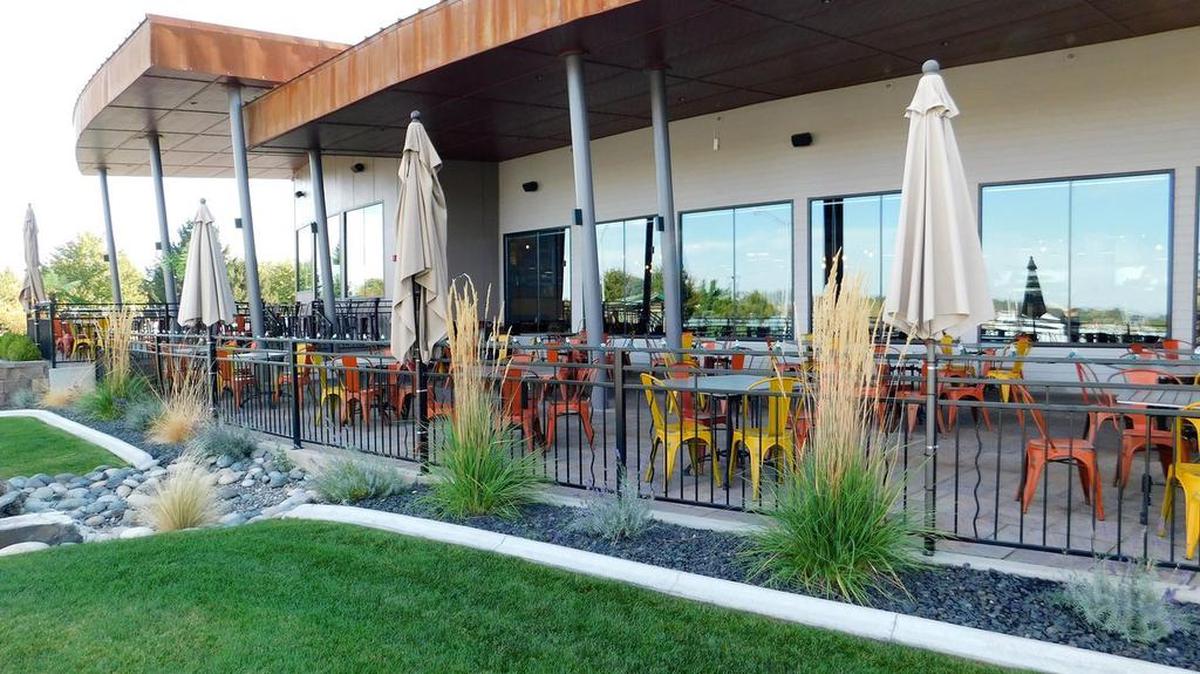 Outdoor dining at LU LU Craft Bar + Kitchen.
