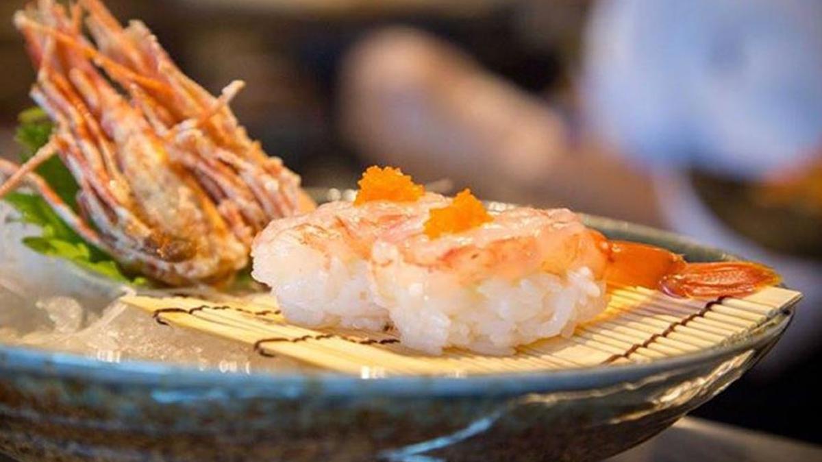 Aki Sushi offers a diverse menu that features a wide array of Japanese cuisine served in a chic, modern atmosphere.