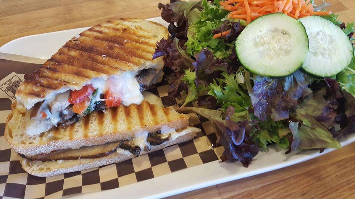 A fresh panini with healthy salad at Graze.