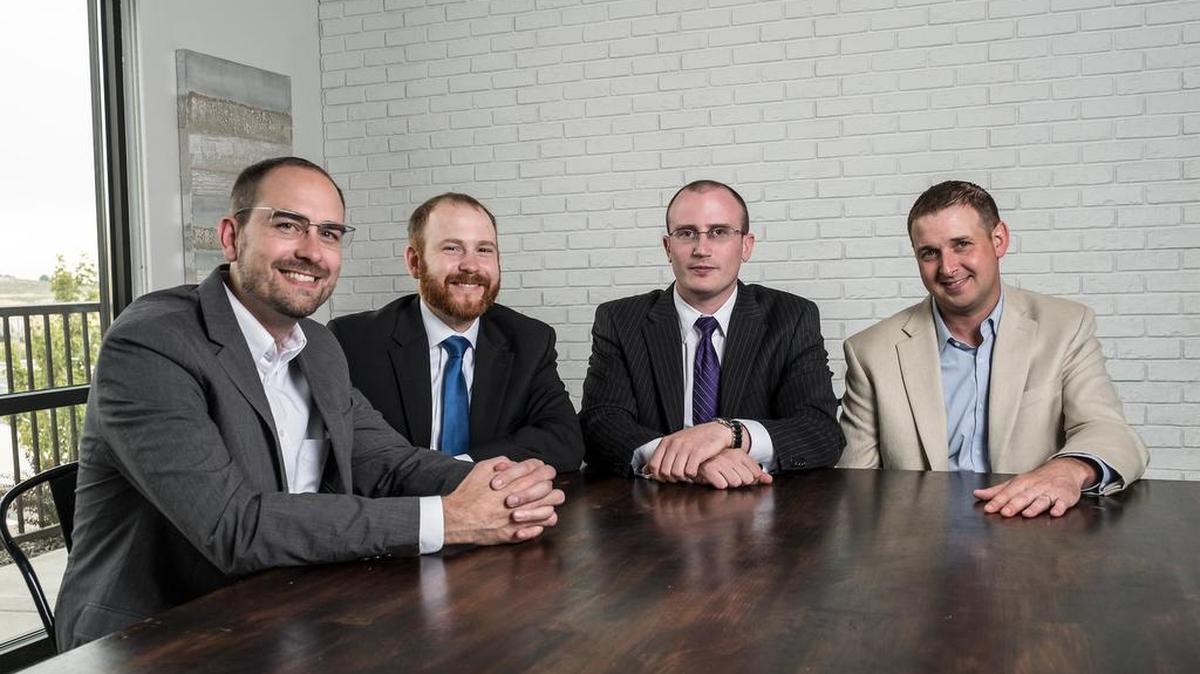 The partners of Gravis Law. From left, Brett Spooner, Asa LaMusga, Derek Johnson, and Matt Johnson.