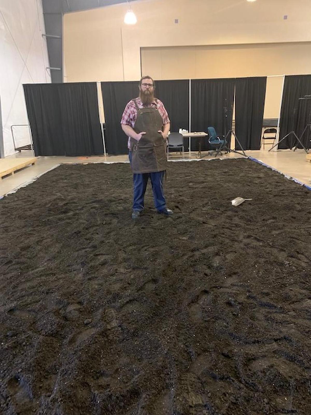 Mike Speegle, director, on the earthen stage.