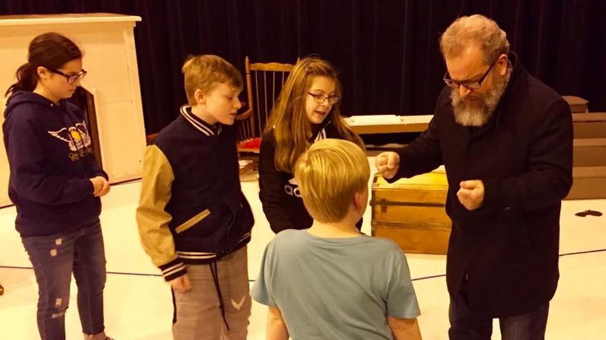 Reginald Unterseher of Mid-Columbia Mastersingers, right, works with young performers in a rehearsal for “Let’s Make an Opera: The Little Sweep,” which runs Jan. 12-13 in Richland.