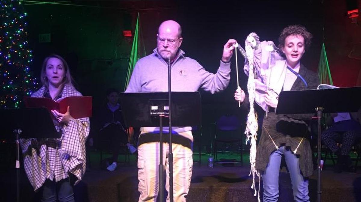 From left, Erin Dickey, David Goss and Cyndi Kimmel rehearse for The Rude Mechanical’s one-night-only readers theater performance of “A Christmas Carol.”