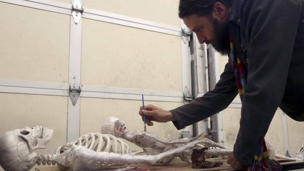 Nick Napoli, Confluent president, works on some of the props that will be used in the space’s first Halloween that will feature a haunted house, the Day of the Dead art show, food, drinks and live music in Richland. The event starts at 7 p.m. Oct. 29 and features handmade props, technology and art.