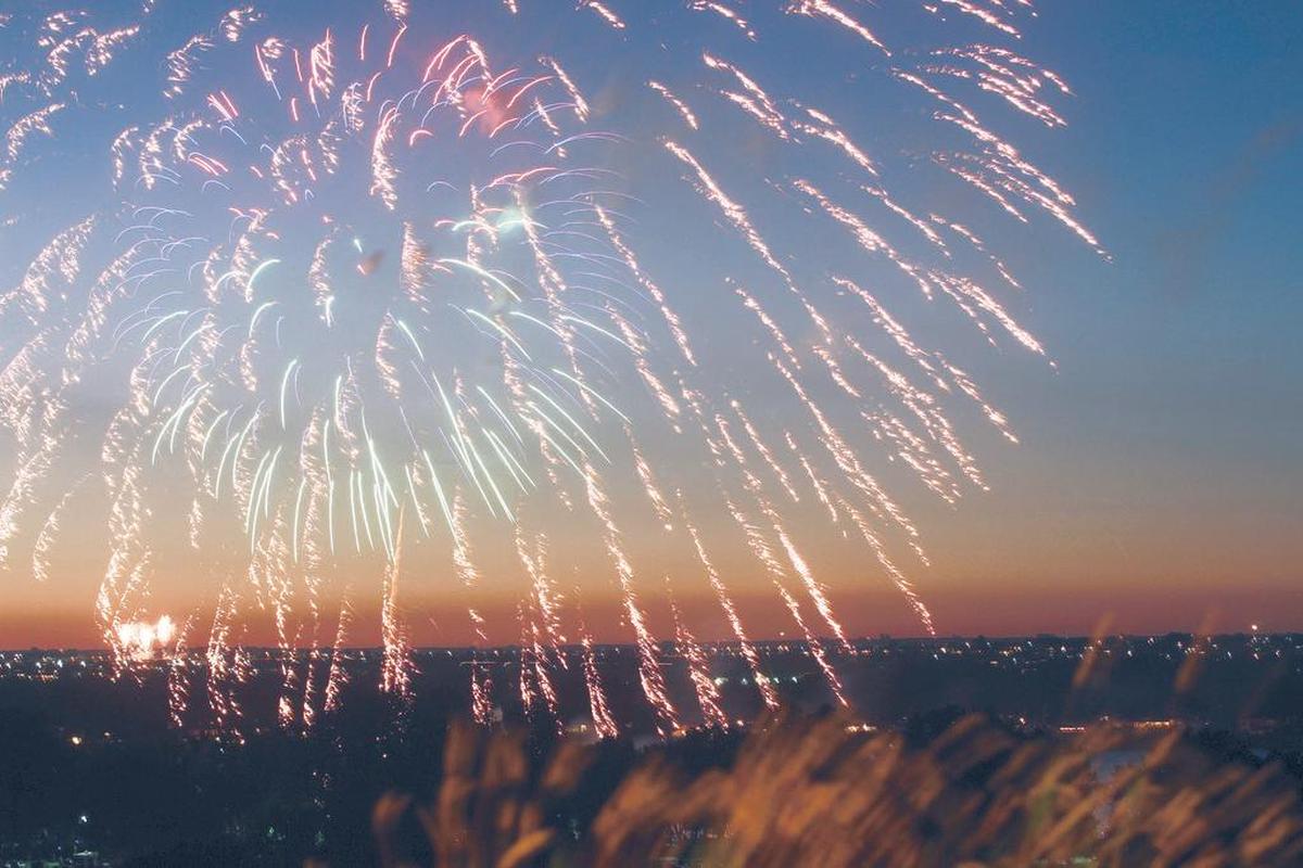 Fireworks sparkle in the sky above the Columbia River during celebrations on the Fourth of July in Kennewick.