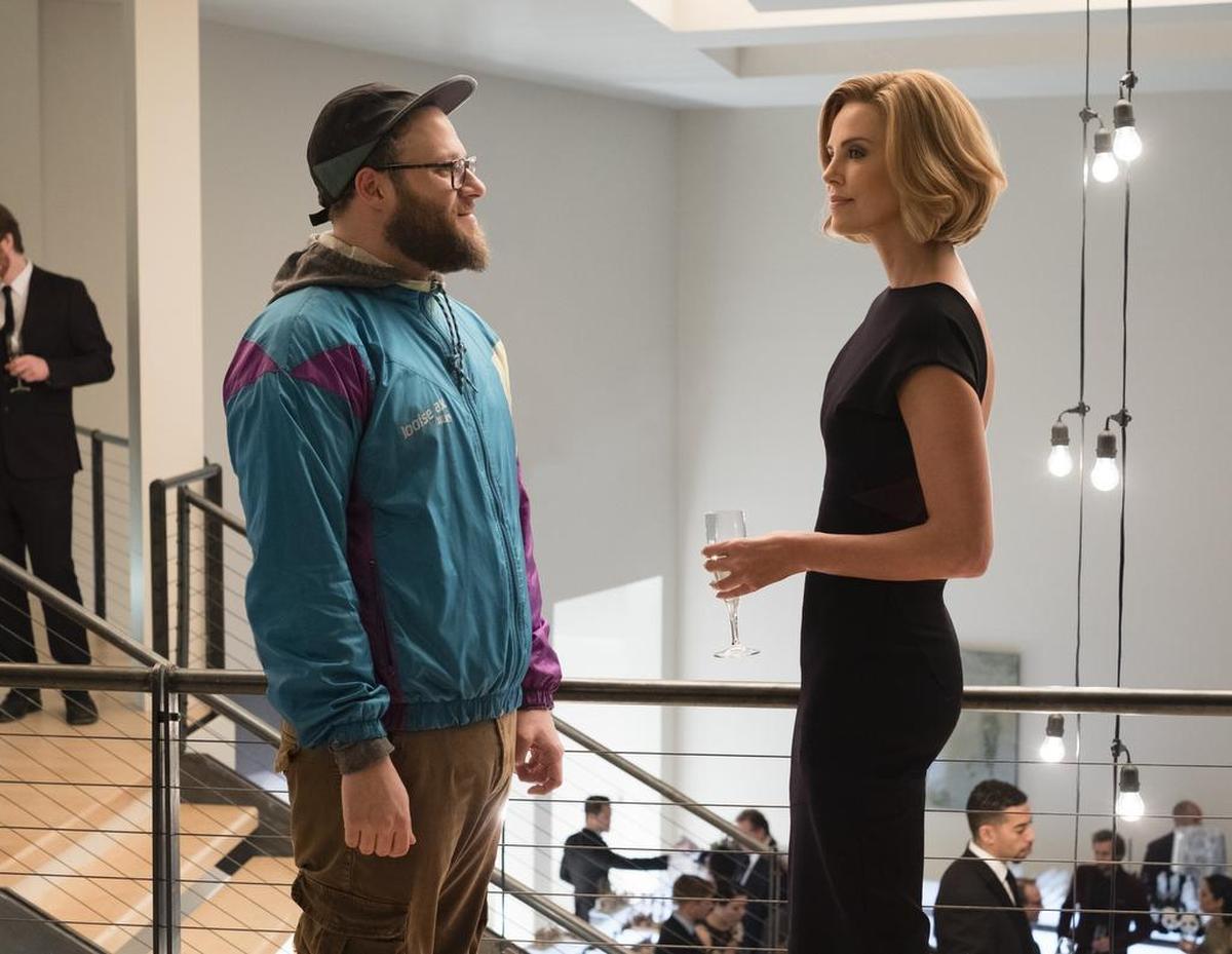 This image released by Lionsgate shows Seth Rogen, left, and Charlize Theron in a scene from "Long Shot."