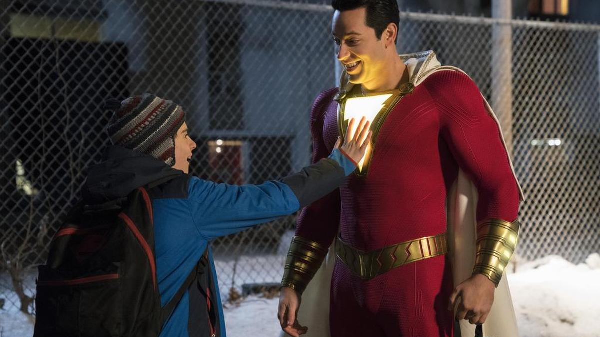 This image released by Warner Bros. shows Zachary Levi, right, and Jack Dylan Grazer in a scene from "Shazam!"