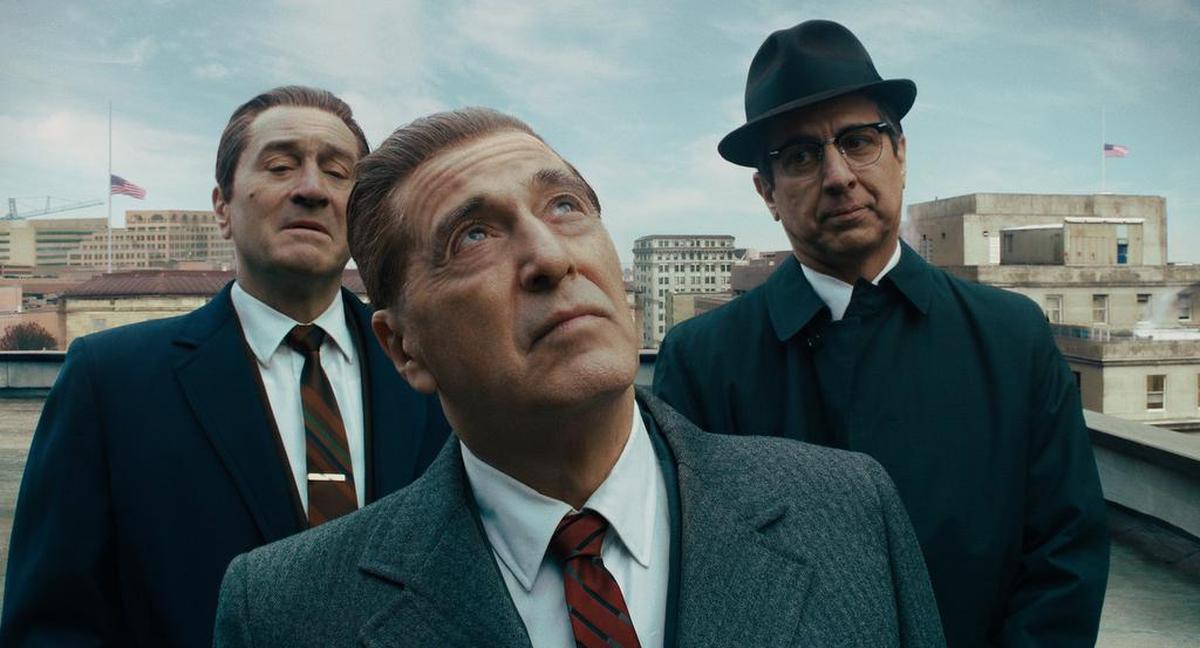From left, Robert De Niro, Al Pacino and Ray Romano in “The Irishman.” (Netflix/TNS)