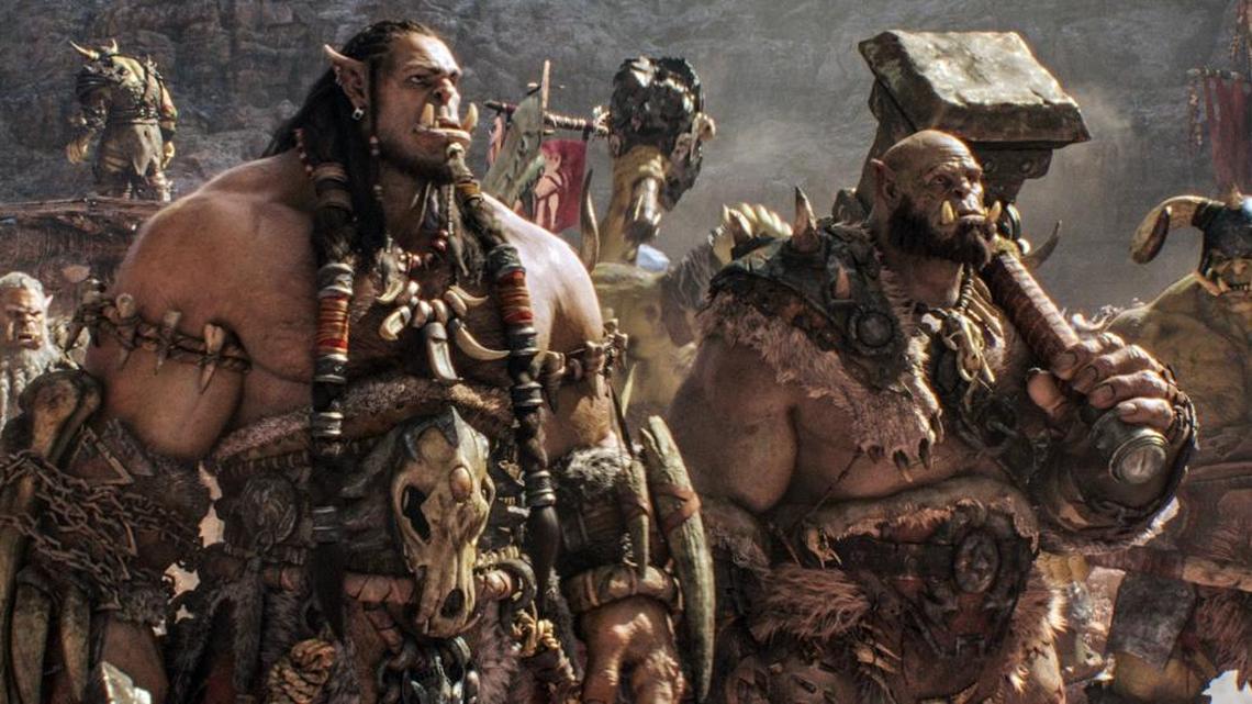 This image released by Universal Pictures shows characters Orc chieftain Durotan, voiced by Toby Kebbell, left, and Orgrim, voiced by Rob Kazinsky, in a scene from the film, “Warcraft,” based on the Blizzard Entertainment video game.