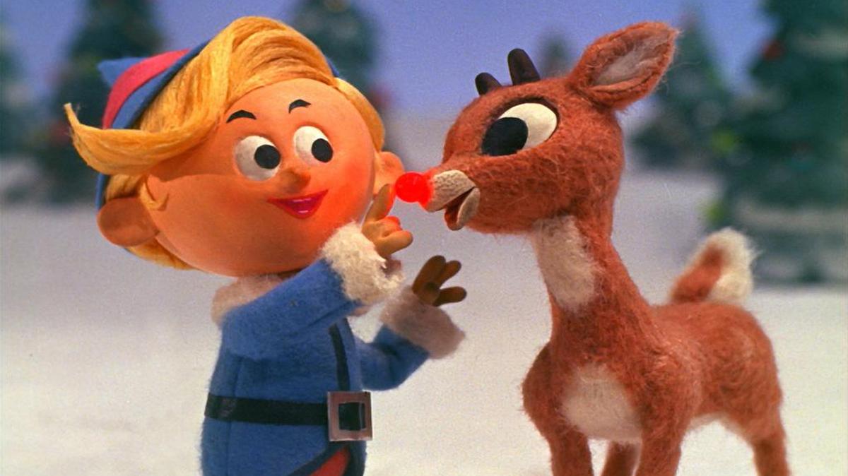This image released by CBS, shows Hermey the Elf, voiced by Paul Soles, left, and Rudolph, voiced by Billie Mae Richards in a scene from the 1964 Rankin & Bass production of “Rudolph The Red-Nosed Reindeer.”