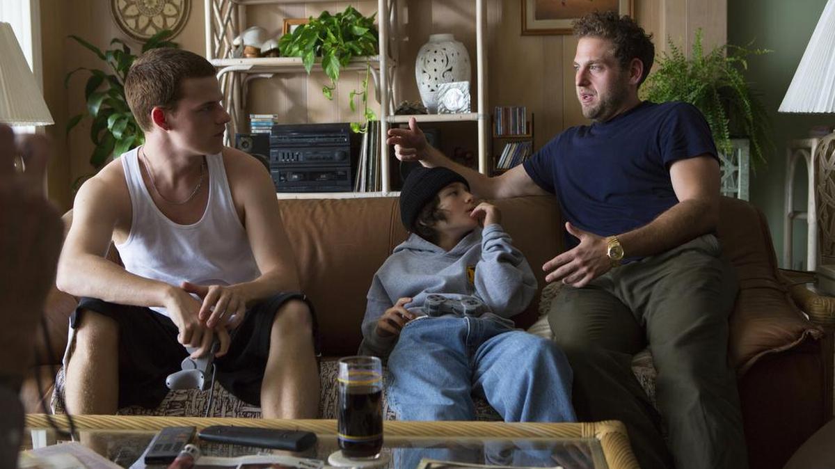 Jonah Hill, right, with cast members Lucas Hedges, left, and Sunny Suljic during the filming of “Mid90s.” Hill’s first screenplay and his first venture into director has the making of an indie hit.