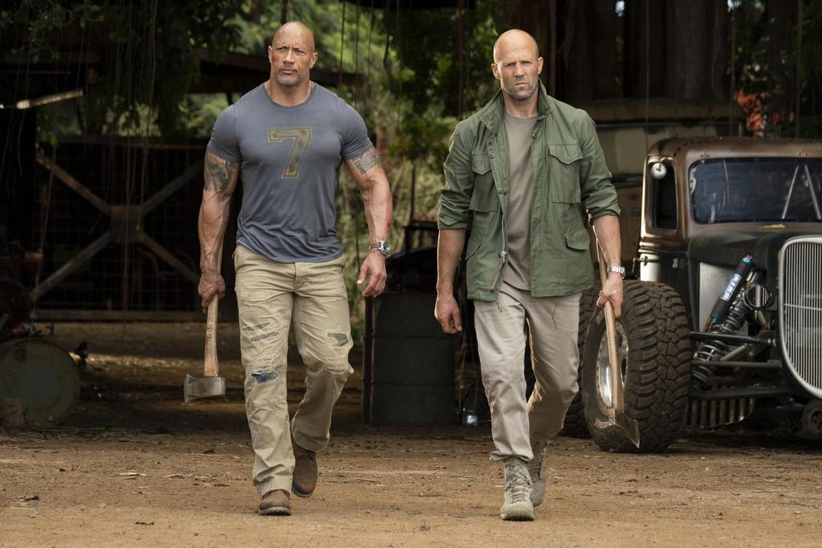Dwayne Johnson, left, and Jason Statham in a scene from "Fast & Furious Presents: Hobbs & Shaw."