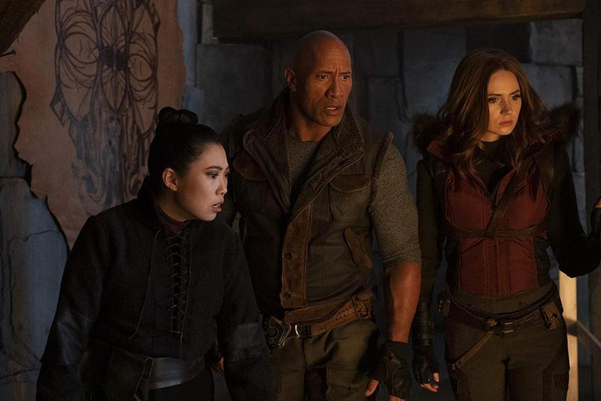 Awkwafina, Dwayne Johnson, and Karen Gillan in “Jumanji: The Next Level.”