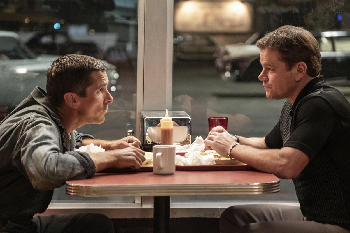 This image released by 20th Century fox shows Christian Bale, left, and Matt Damon in a scene from "Ford v. Ferrari," in theaters on Nov. 15.