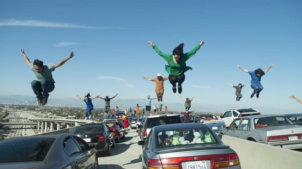 This scene is from the opening number of “La La Land.” It was staged on a real Los Angeles highway interchange.