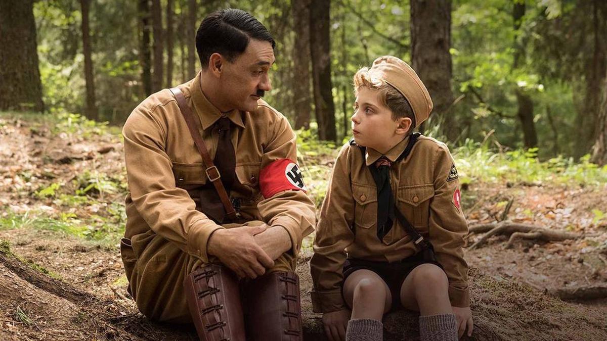 Taika Waititi (left) and Roman Griffin Davis in "Jojo Rabbit."