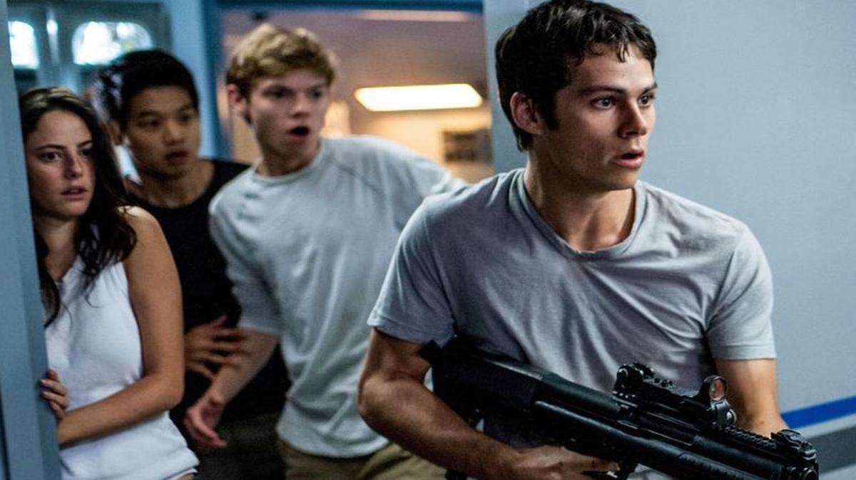 
Thomas (Dylan O’Brien, right) leads Teresa (Kaya Scodelario), Minho (Ki Hong Lee) and Newt (Thomas Brodie-Sangster) in a daring escape in Maze Runner: The Scorch Trials.
