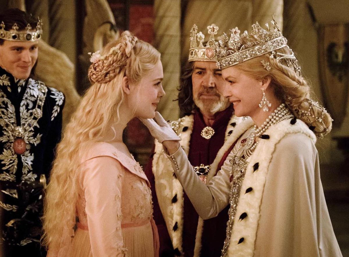 From left, Harris Dickinson as Prince Phillip, Elle Fanning as Aurora, Robert Lindsay as King John and Michelle Pfeiffer as Queen Ingrith in a scene from "Maleficent: Mistress of Evil."