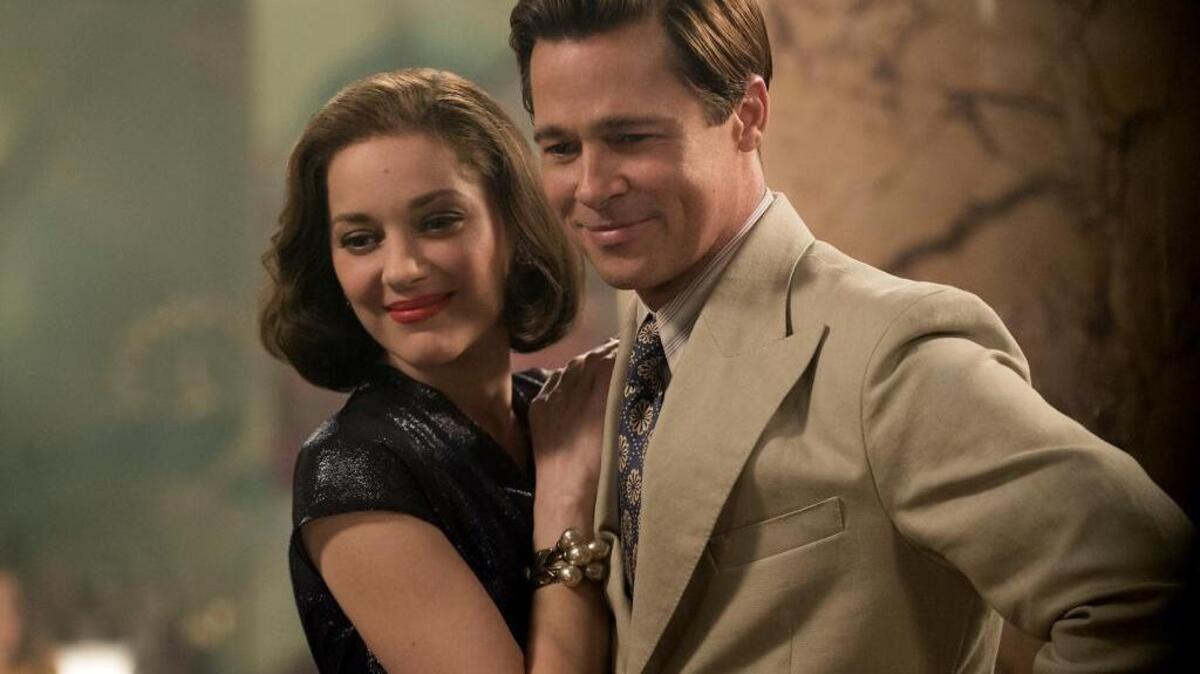 Marion Cotillard and Brad Pitt appear in a scene from “Allied.”