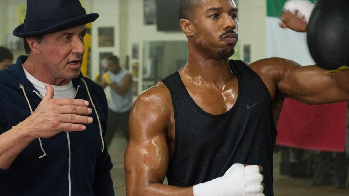 Michael B. Jordan, right, plays Adonis Johnson and Sylvester Stallone plays Rocky Balboa in Creed.