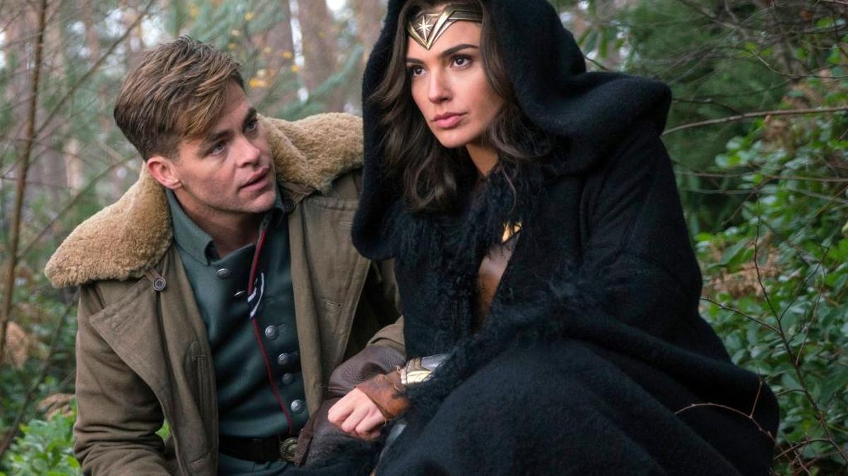 This image released by Warner Bros. Pictures shows Chris Pine, left, and Gal Gadot in a scene from, “Wonder Woman.”