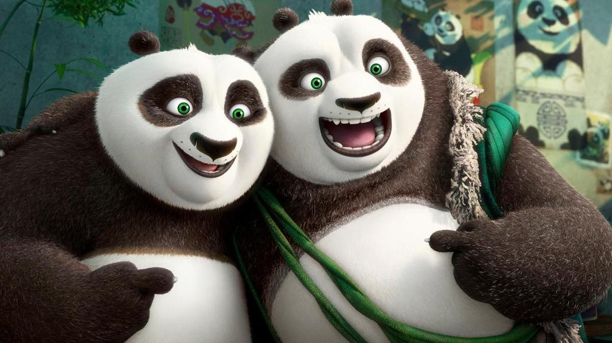 Po (voiced by Jack Black) and his long-lost panda father Li (voiced by Bryan Cranston) pose for a portrait in Kung Fu Panda 3.