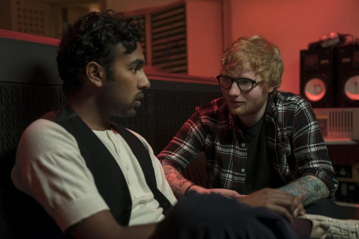 This image released by Universal Pictures shows Himesh Patel, left, and Ed Sheeran in a scene from "Yesterday."