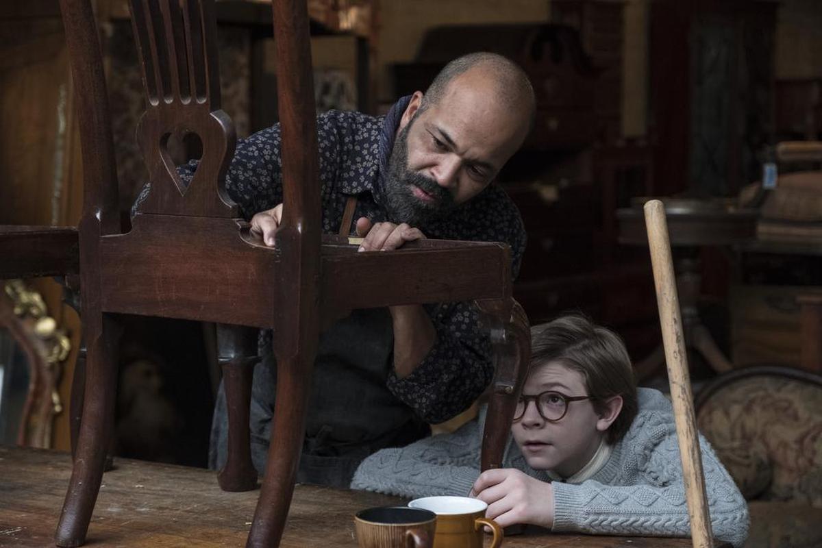 Jeffrey Wright, left, and Oakes Fegley in a scene from "The Goldfinch," in theaters on Sept. 13.