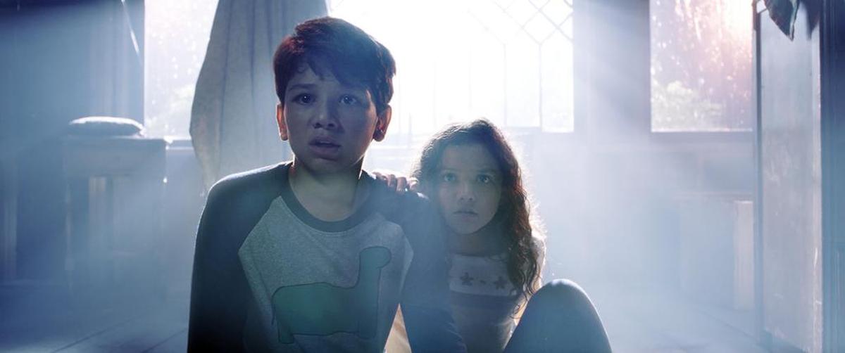 This image released by Warner Bros. Pictures shows Roman Christou, left, and Jaynee-Lynne Kinchen in a scene from "The Curse of La Llorona."