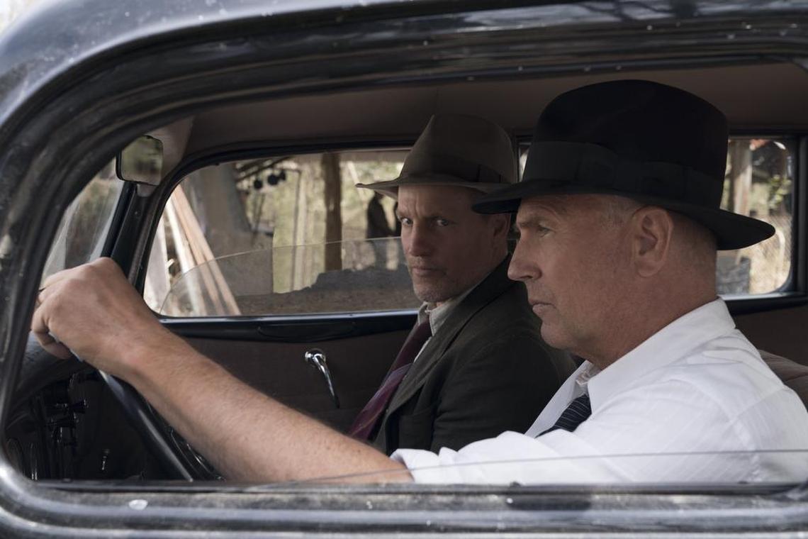 This image released by Netflix shows Woody Harrelson, left, and Kevin Costner in a scene from "The Highwaymen."