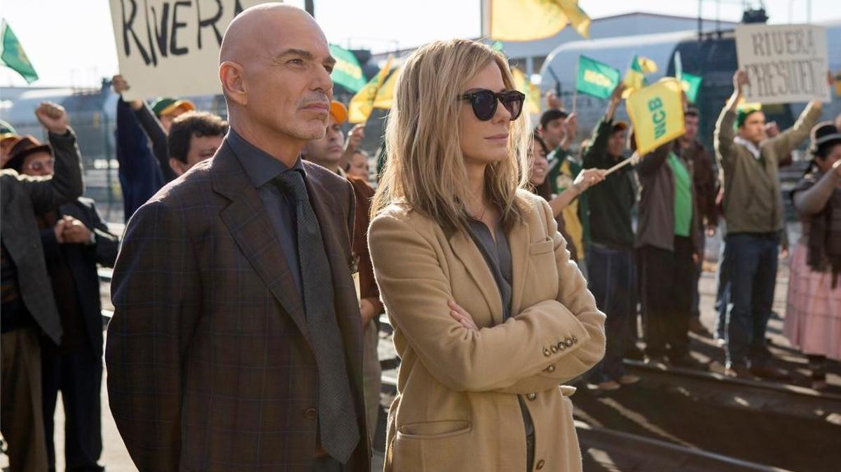 Billy Bob Thornton plays Pat Candy and Sandra Bullock plays Jane in Our Brand is Crisis.