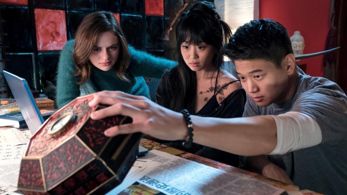 From left: Joey King stars as Claire, Alice Lee as Gina and Ki Hong Lee as Ryan in the film “Wish Upon.”