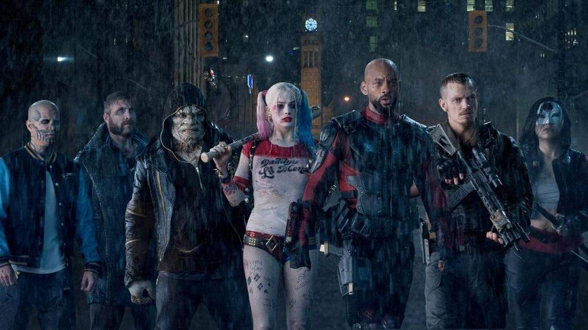 Diablo (Jay Hernandez), from left to right, Boomerang (Jai Courtney), Killer Croc (Adewale Akinnuoye-Agbaje), Harley Quinn (Margot Robbie), Deadshot (Will Smith), Rick Flag (Joel Kinnaman) and Katana (Karen Fukuhara) star in “Suicide Squad.”