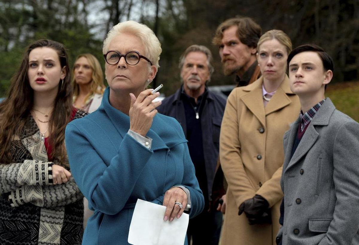 Katherine Langford, from left, Toni Collette, Jamie Lee Curtis, Don Johnson, Michael Shannon, Riki Lindholm and Jaeden Lieberher in a scene from “Knives Out.”
