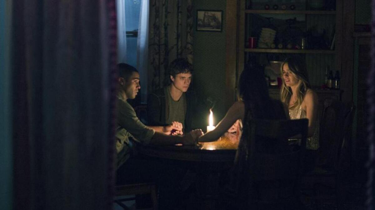 Douglas Smith, Lucien Laviscount, Jenna Kanell and Cressida Bonas in “The Bye Bye Man.”