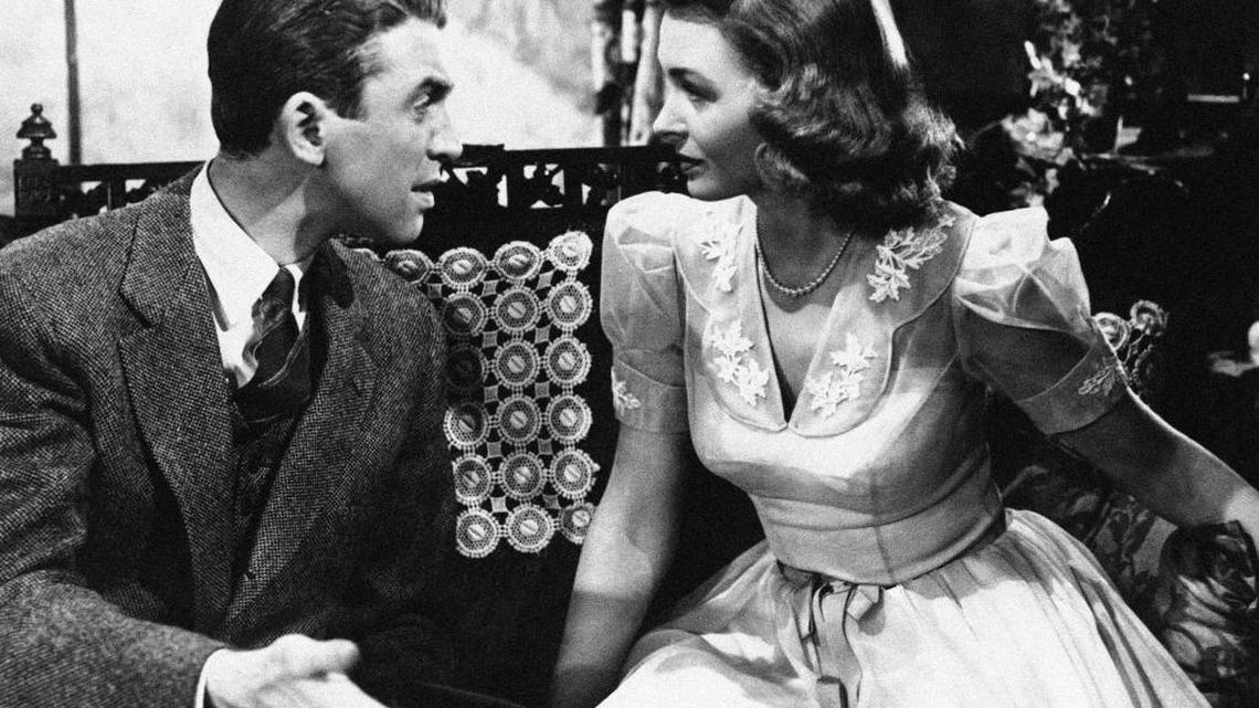 Jimmy Stewart explains things to Donna Reed in “It’s a Wonderful Life.”