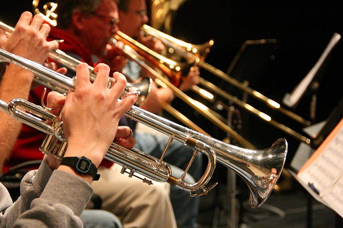 Trumpet players with the Mid-Columbia Symphony practice during a 2012 rehearsal.