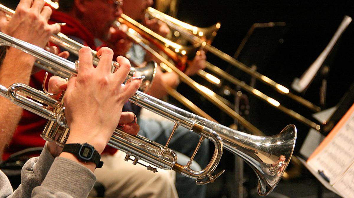 Trumpet players with the Mid-Columbia Symphony practice during a 2012 rehearsal.