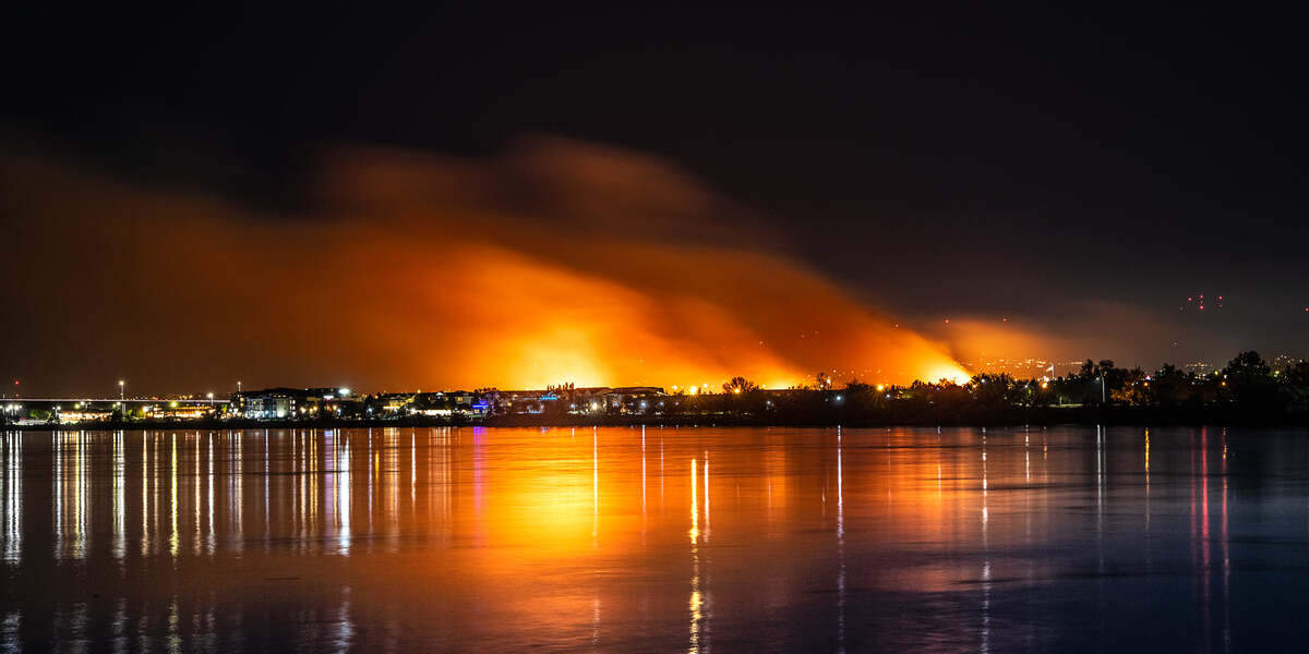 A view of the Yakima River delta and Columbia Point fires from Howard Amon Park in Richland from professional photographer Scott Butner.