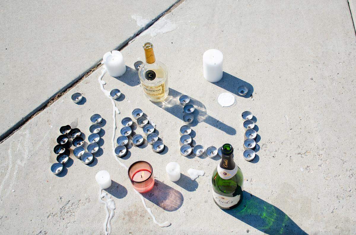Candles spell out “NALI” in memory of Denali Anderson, the 20-year-old Kennewick man who was killed during a 2022 party on Pimlico Drive in Pasco, WA.
