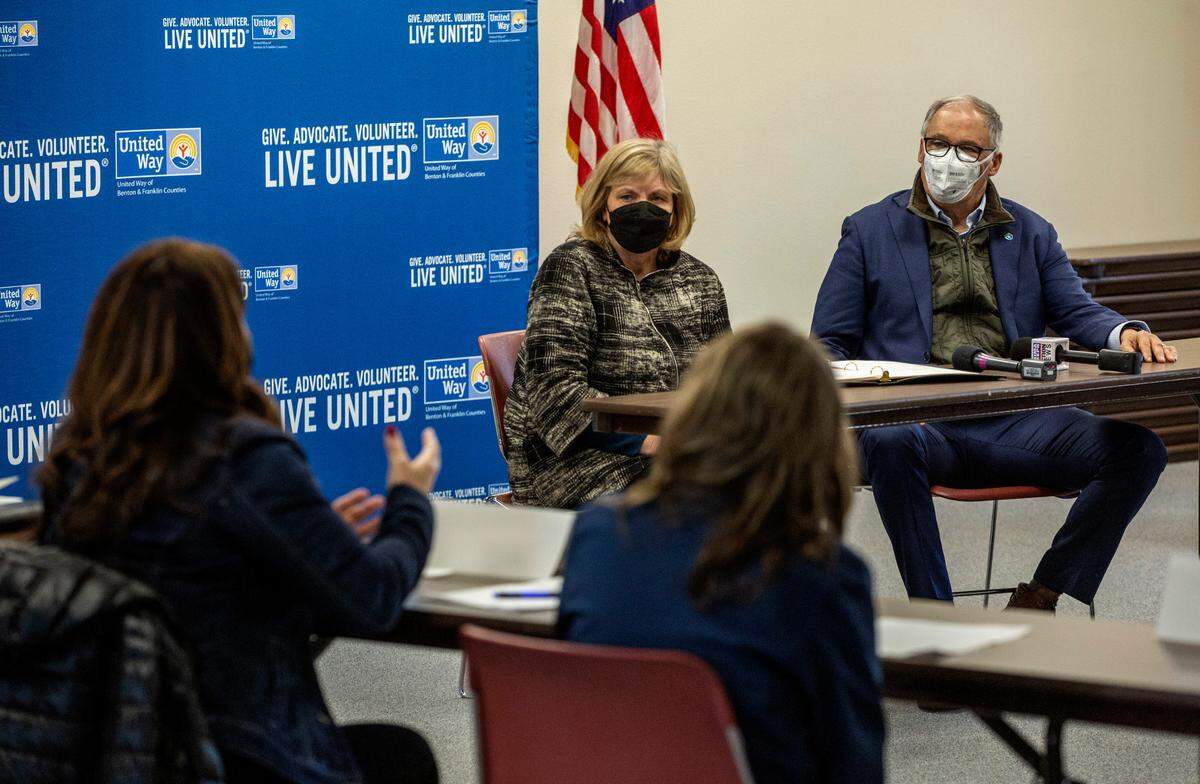 During a visit to Tri-Cities on Tuesday, Washington Gov. Jay Inslee and First Lady Trudi Inslee participate in a discussion at The United Way in Kennewick with Tri-Cities community leaders and city officials working on issues related to affordable housing and homelessness.