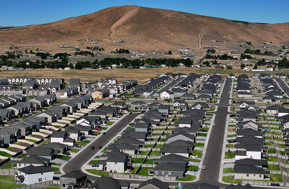 Housing off Paradise Way near Van Giesen Street in West Richland with Red Mountain in the background