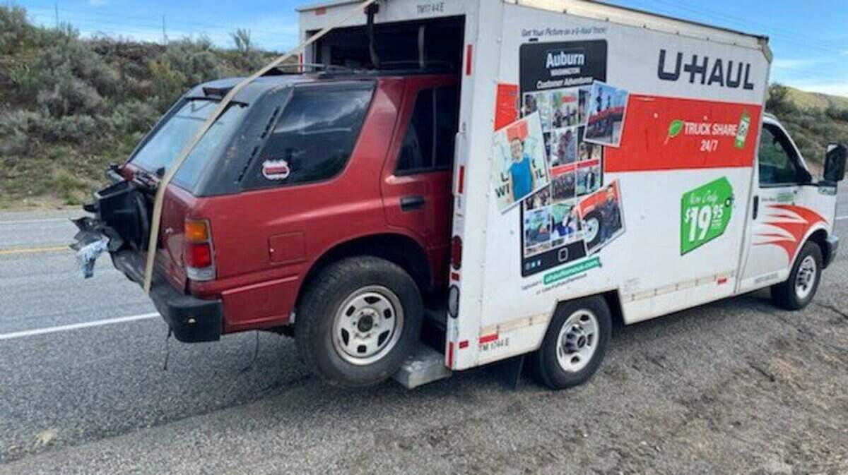 Washington State Patrol Trooper John Bryant posted this photo a U-Haul driver with a SUV loaded in the back.
