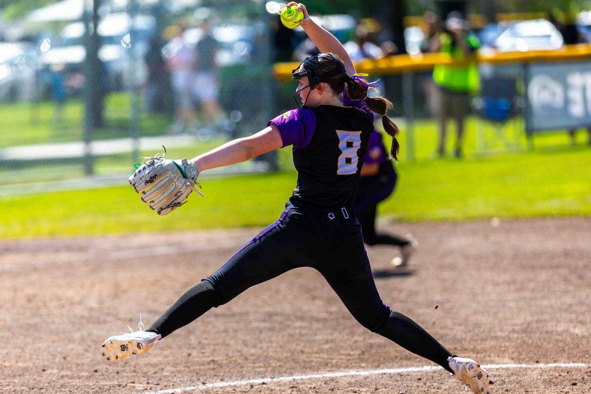 Hanford Falcons senior pitcher Heidi Sweet, No. 8, delivers against the North Creek Jaguars of Bothell during opening round play of the 4A State Fastpitch Softball Championships on Friday in Richland. Hanford defeated North Creek 4-2 to advance in the state tournament