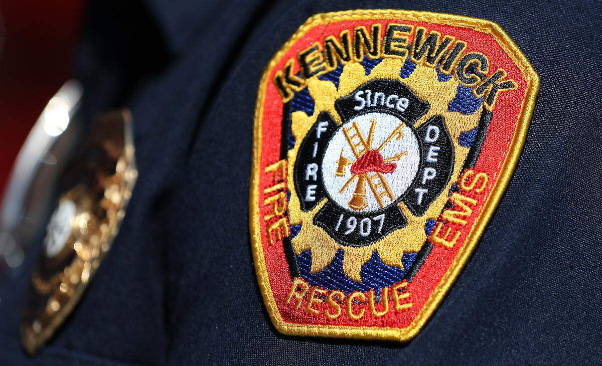 Kennewick Fire Department patch on uniform in 2025.