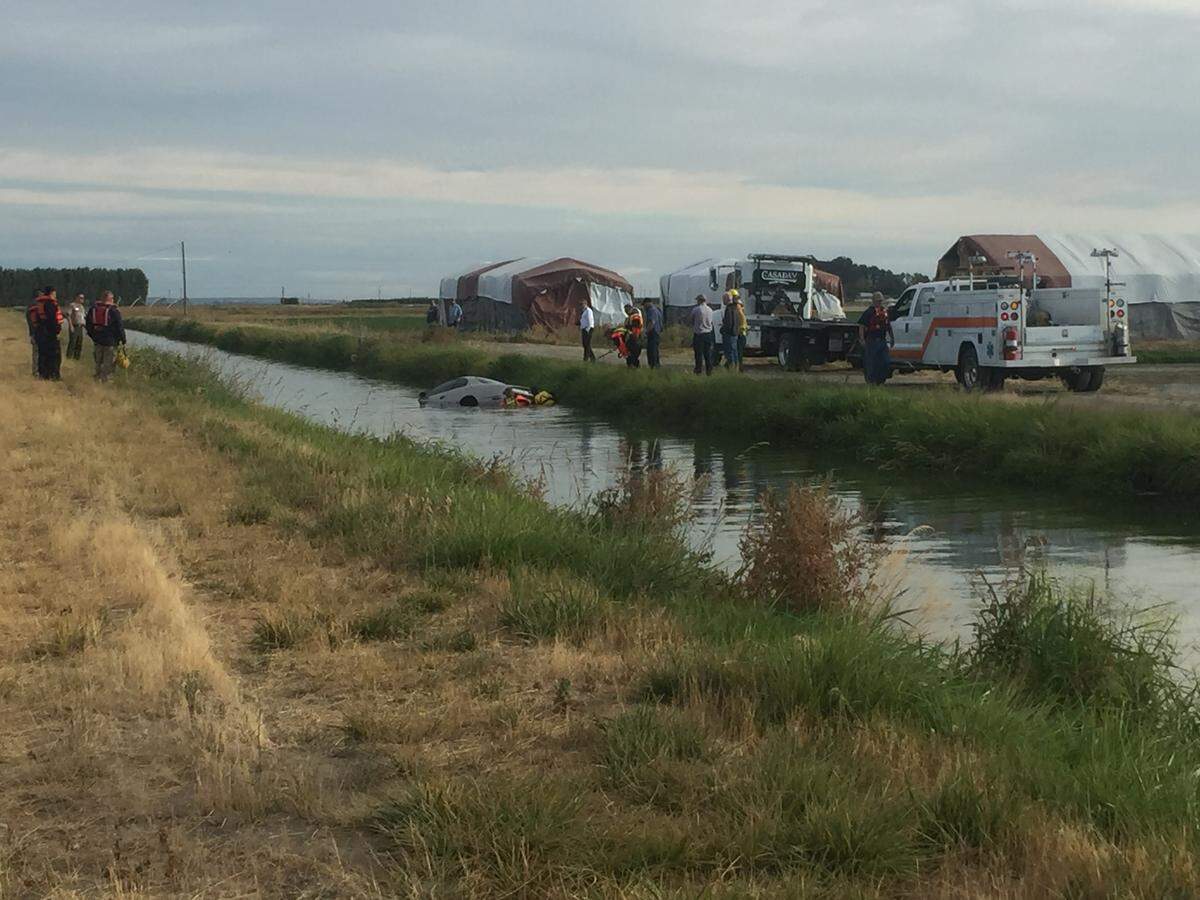 One man is dead after a car crashed into an irrigation canal north of Pasco.