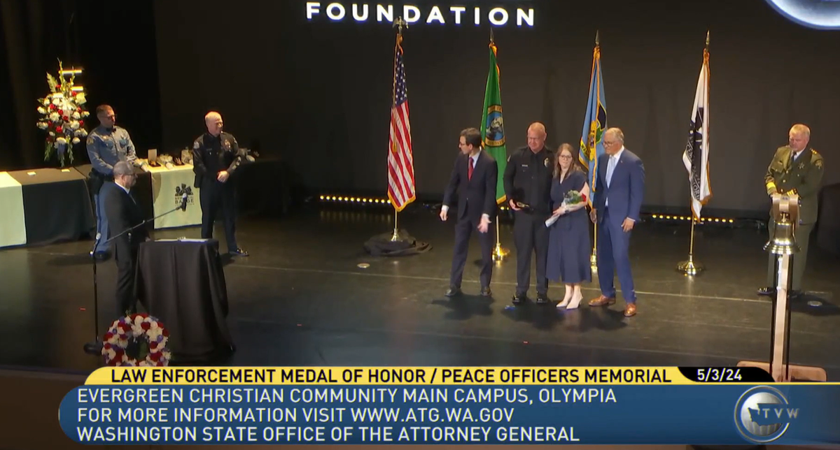 Pasco Officer Phil Hanks receives the Law Enforcement Medal of Honor, Washington state’s highest award for police..