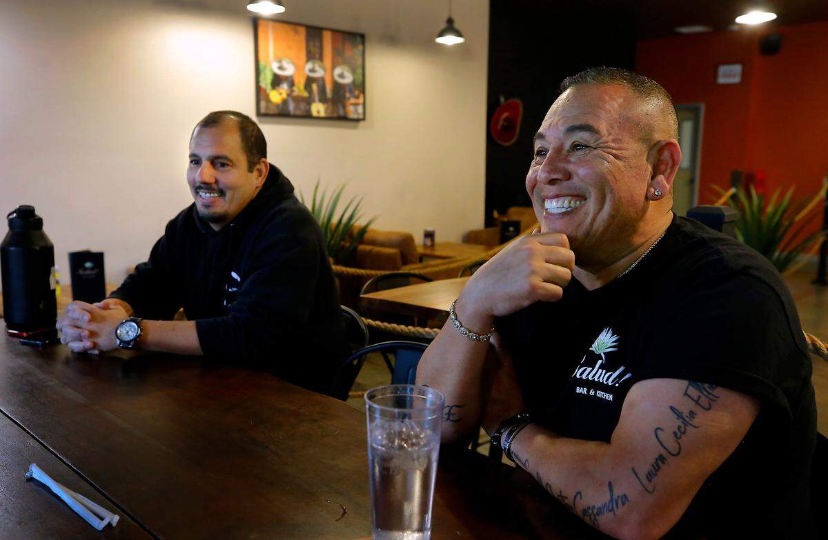 Jesse Martinez, left, and Carmel Perez will celebrate the grand reopening of Salud! Bar and Kitchen at the Riverfront Hotel on Dec. 5.