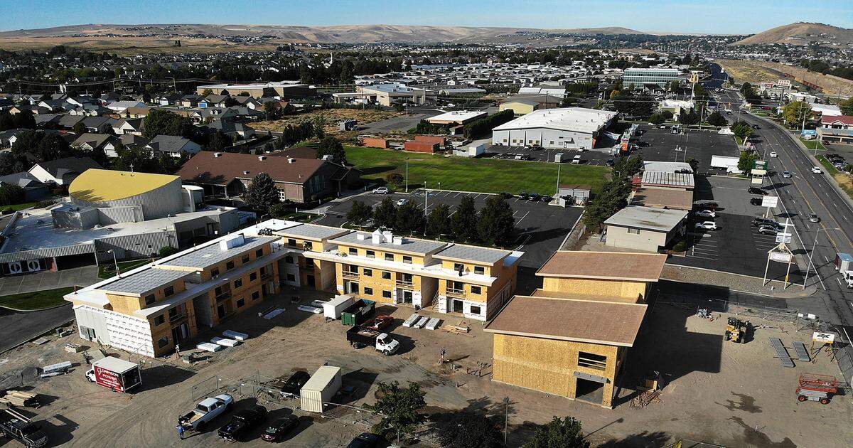 Construction is proceeding on Clearwater Lofts, a 32-unit residential and commercial project near the Catholic Parish of The Holy Spirit church in western Kennewick.
