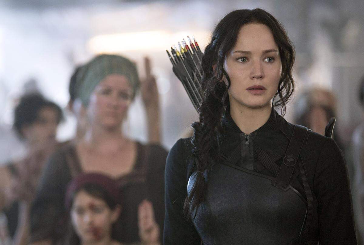 In this image released by Lionsgate, Jennifer Lawrence portrays Katniss Everdeen in a scene from “The Hunger Games: Mockingjay Part 1.” (AP Photo/Lionsgate, Murray Close)